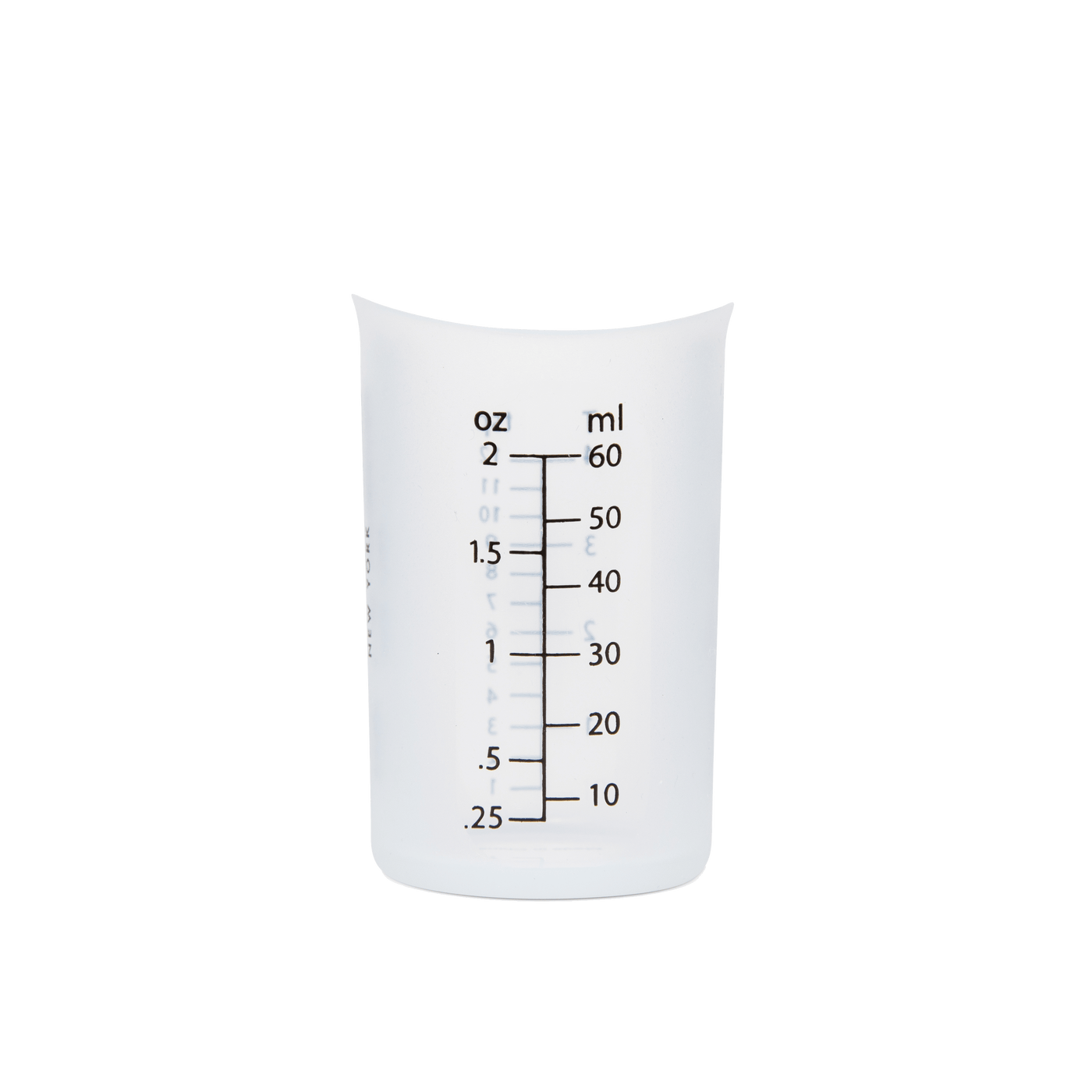 The Laundress Laundry Measuring Cup, a reusable silicone cup for doing The Laundress fabric care solutions.