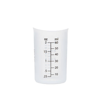 The Laundress reusable silicone Laundry Measuring Cup for dosing The Laundress fabric care solutions.